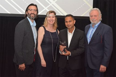 Photo of ReachLocal representatives receiving prize from WSI.