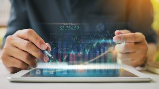 Businessman analyzing company financial report balance statement working with digital augmented reality.