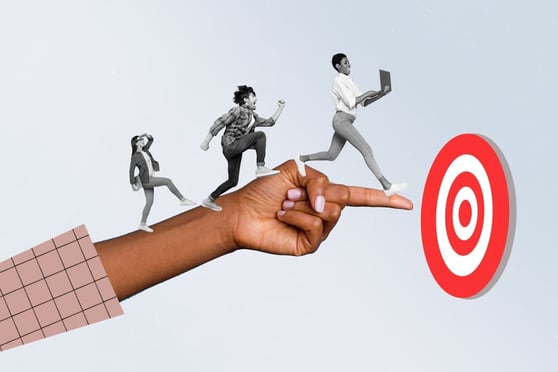 People progressing toward a target, symbolizing steps in a customer journey map.
