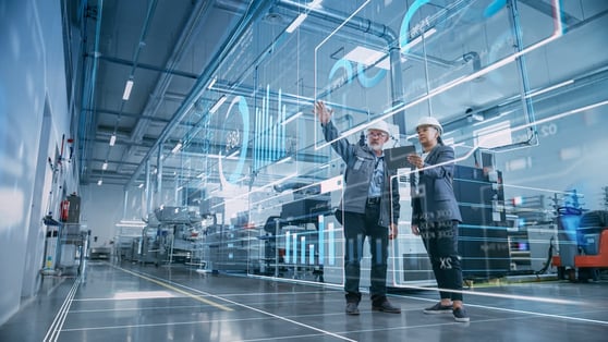 Two Industrial Engineers Use Tablet Computer, Visualize the Wall of Big Data Statistics