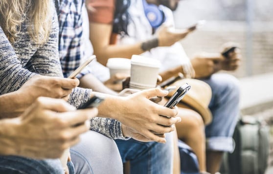 Group of people using smart phones
